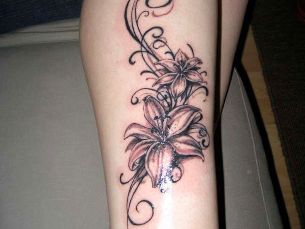 Black Ink Lily Flowers Tattoo Design For Side Leg Calf