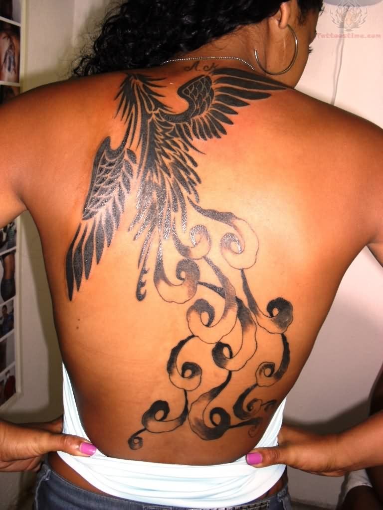 Black Ink Phoenix Tattoo On Girl Back