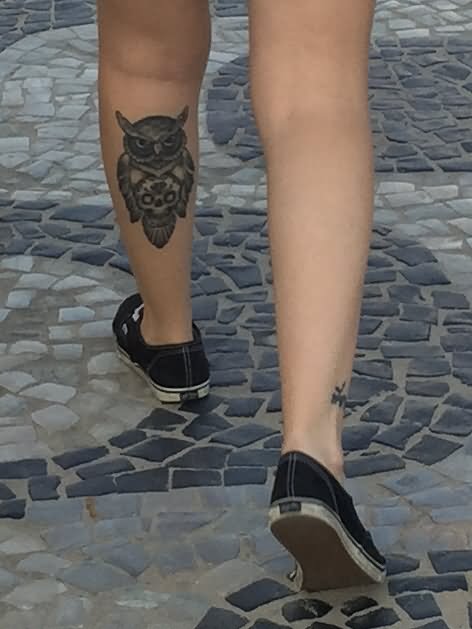 Black Ink Skull With Owl Tattoo On Girl Left Leg Calf
