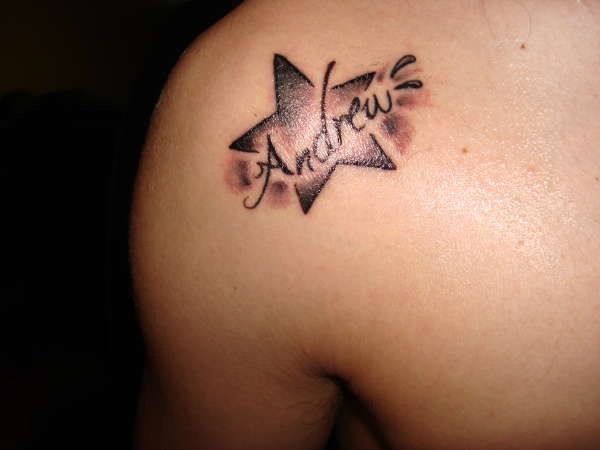 Black Ink Star With Andrew Name Tattoo Design For Shoulder