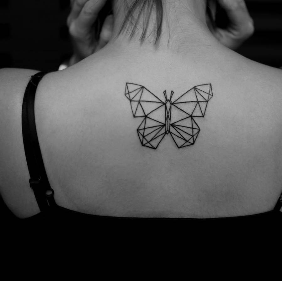 Black Outline Geometric Butterfly Tattoo On Girl Upper Back