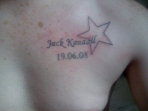 Black Outline Star With Jack Kendall Name Tattoo On Man Chest