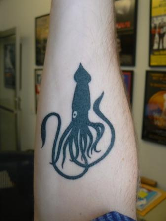 Black Squid Tattoo On Forearm