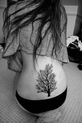 Black Tree Tattoo On Women Lower Back