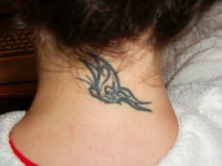 Black Tribal Butterfly Tattoo On Back Neck