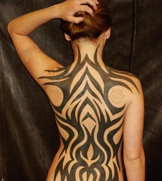 Black Tribal Design Tattoo On Women Full Back