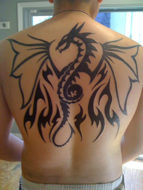 Black Tribal Dragon Tattoo On Full Back