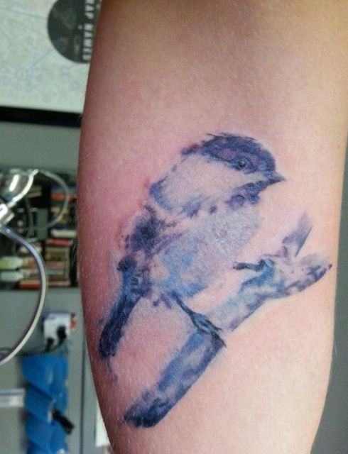 Blue Ink Sparrow Tattoo On Leg