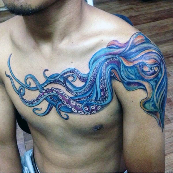 Blue Ink Squid Tattoo On Man Chest