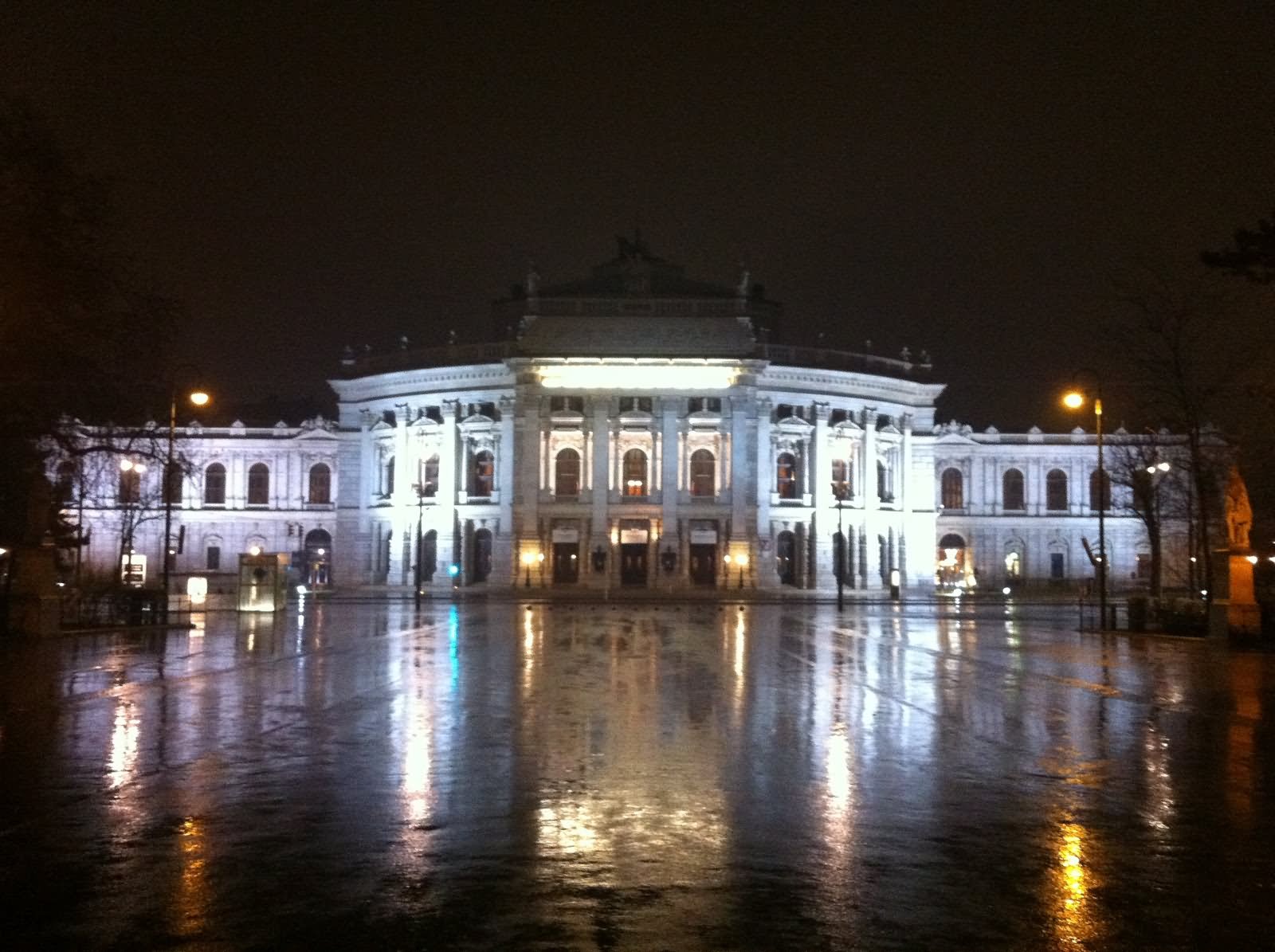 Burgtheater Illuminated At Night In Vienna, Austria