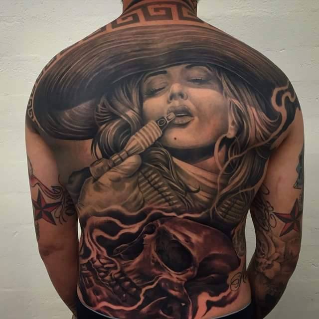 Charra and Skull Tattoo On Full Back by Ab Martinez