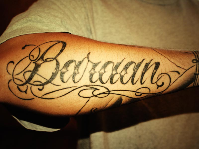 Classic Baraan Name Tattoo On Right Arm