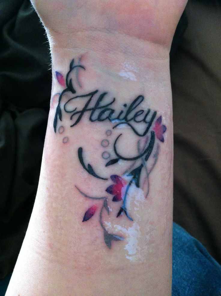 Classic Flowers With Hailey Name Tattoo On Wrist