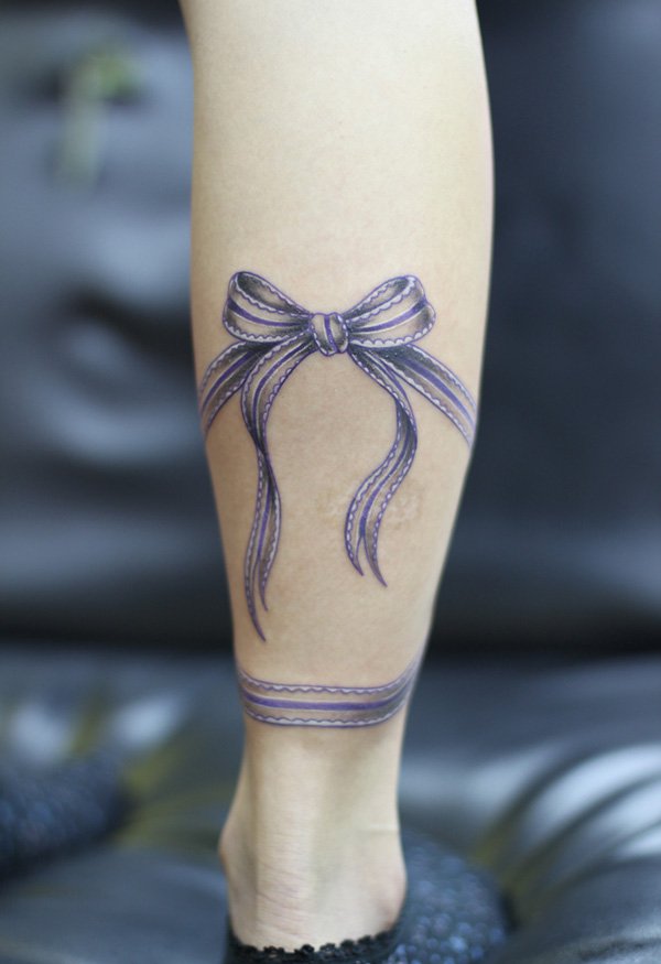 Classic Ribbon Bow Tattoo Design For Leg Calf By