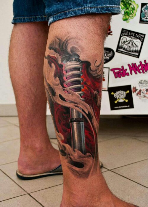 Classic Ripped Skin Shocker Tattoo On Right Leg Calf