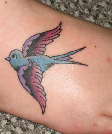 Color Sparrow Tattoo On Right Foot