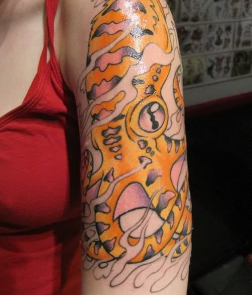 Colored Squid Tattoo On Girl Left Arm