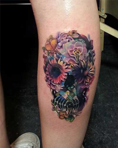 Colorful Flowers Skull Tattoo On Side Leg Calf