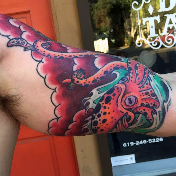 Colorful Inner Bicep Squid Tattoo