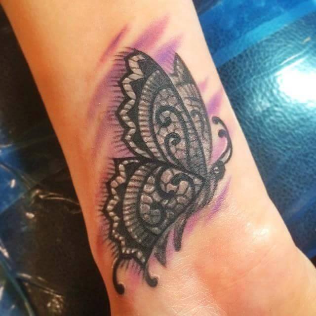 Cool Butterfly Tattoo On Wrist by Megan Massacre
