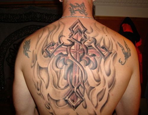 Cross In Flame Tattoo On Upper Back