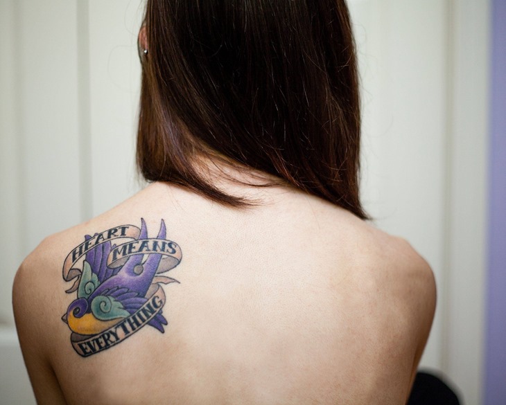 Cute Bird With Banner Tattoo On Women Left Back Shoulder