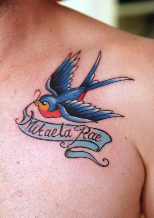 Cute Flying Bird With Mikaela Rae Name Banner Tattoo On Left Front Shoulder