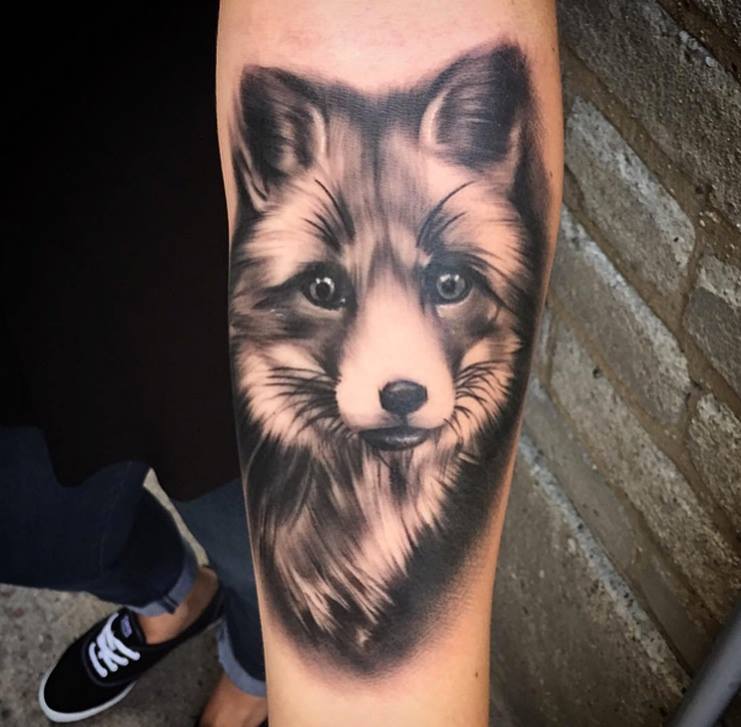 Cute Grey Ink Fox Tattoo On Left Arm