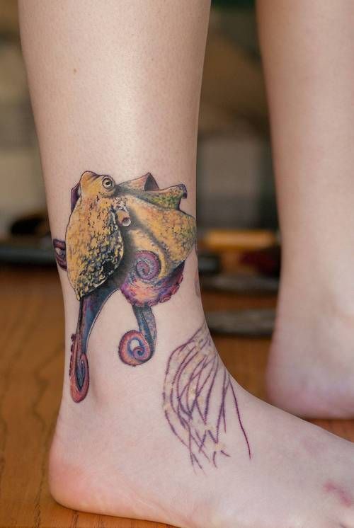 Cute Little Squid Tattoo On Leg