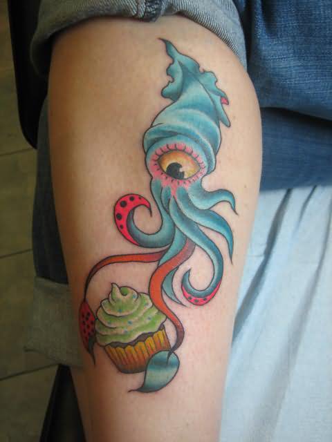 Cute Squid With Cupcake Tattoo On Leg