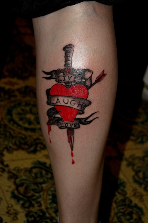 Dagger In Heart With Banner Tattoo Design For Leg Calf