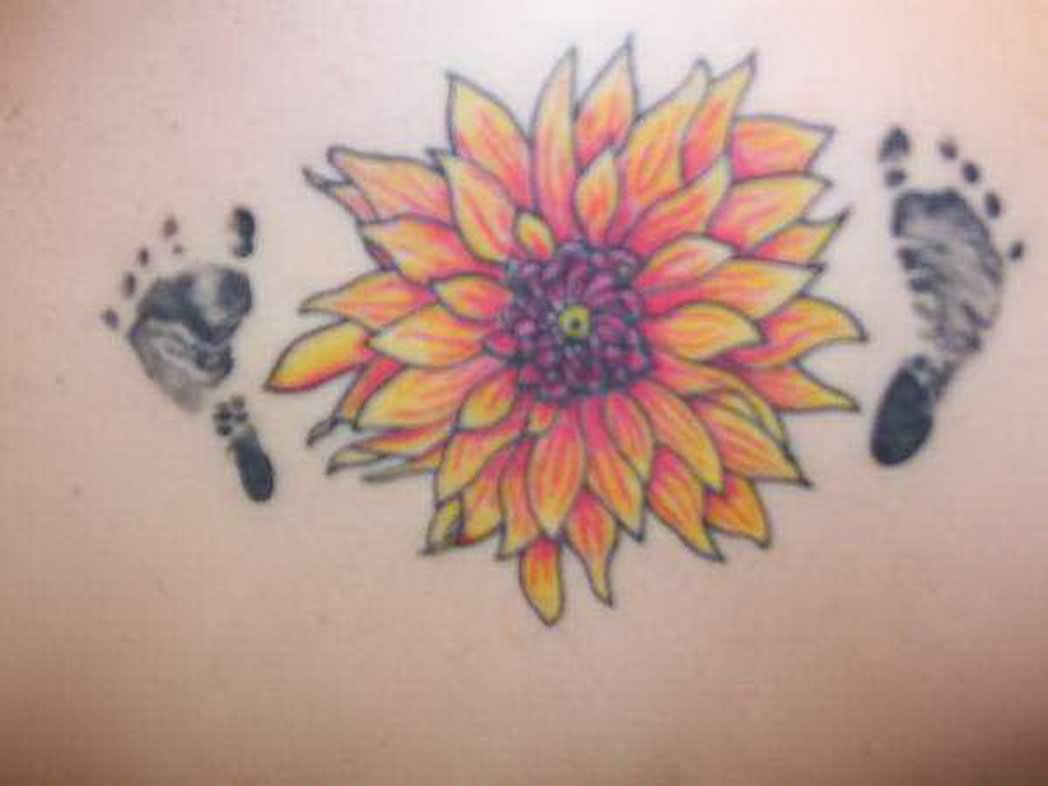 Dahlia Flower With Feet Print Tattoo Design