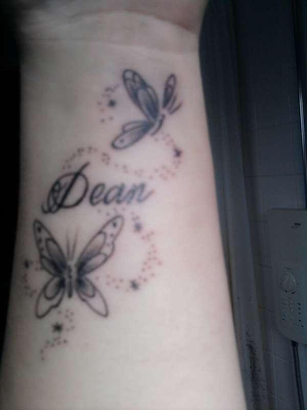 Dean Name With Butterflies Tattoo On Wrist