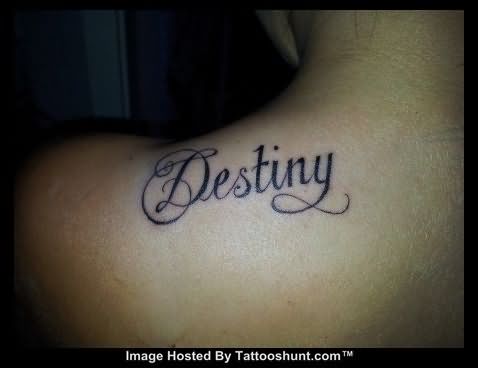 Destiny Name Tattoo On Left Upper Shoulder