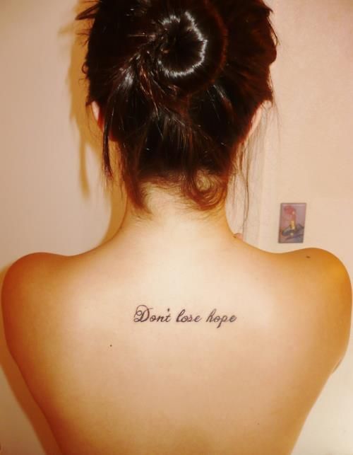 Don't Lose Hope Lettering Tattoo On Girl Upper Back