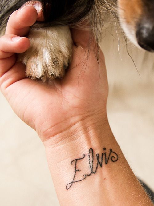 Elvis Name Tattoo On Right Wrist