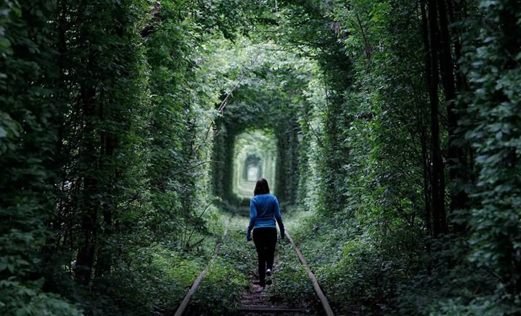 Girl Walking On The Railway Track At Tunnel Of Love In Klevan, Ukraine