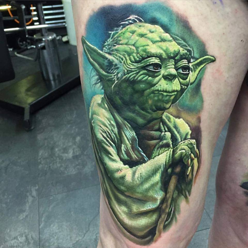 Green Ink Star Wars Yoda Tattoo On Right Thigh