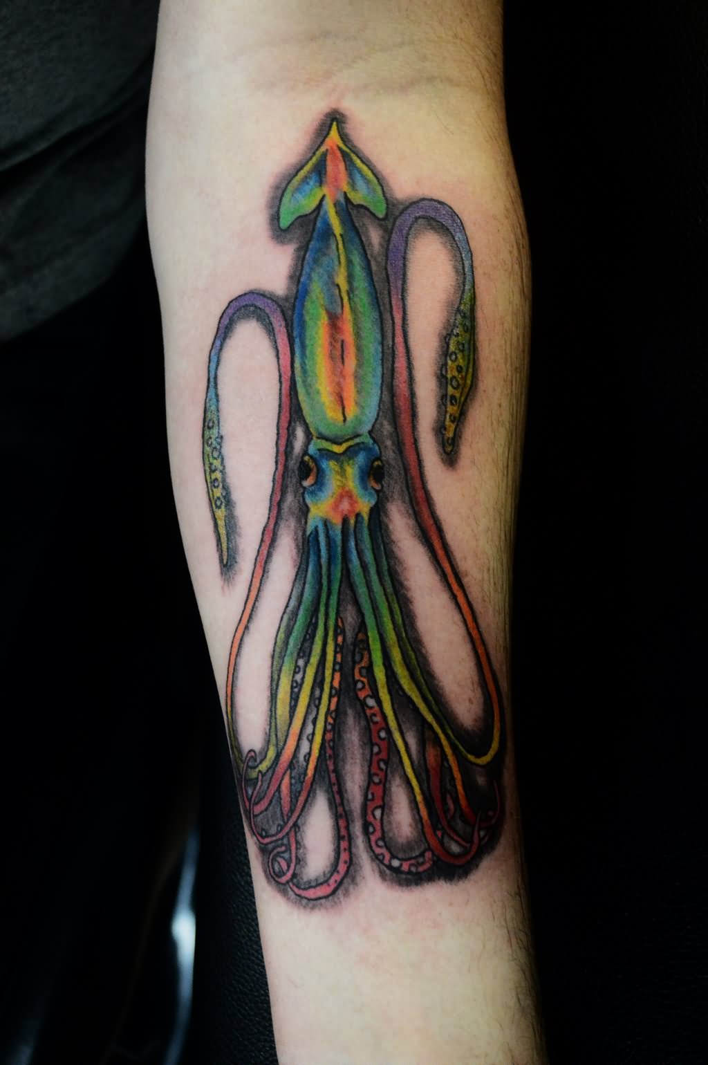 Green Squid Tattoo On Left Forearm