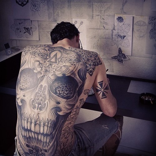 Grey Ink Skull Tattoo On Full Back