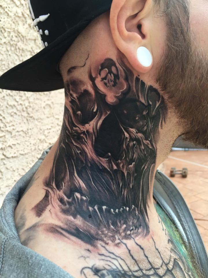Grey Ink Skull Tattoo On Side Neck