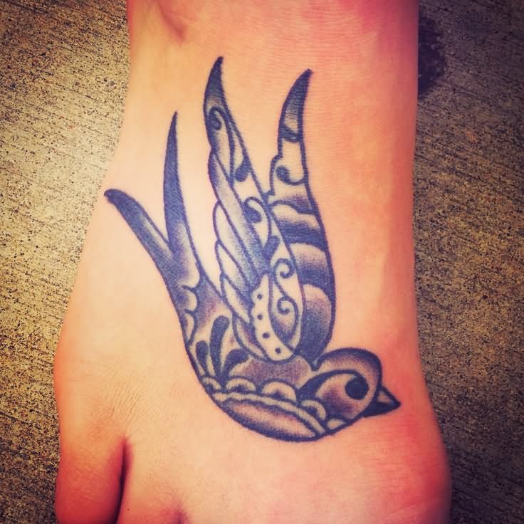Grey Ink Sparrow Tattoo On Right Foot