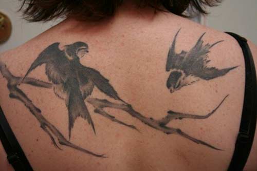 Grey Ink Sparrow Tattoo On Upper Back