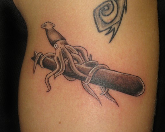 Grey Ink Squid Tattoo On Left Arm Bicep
