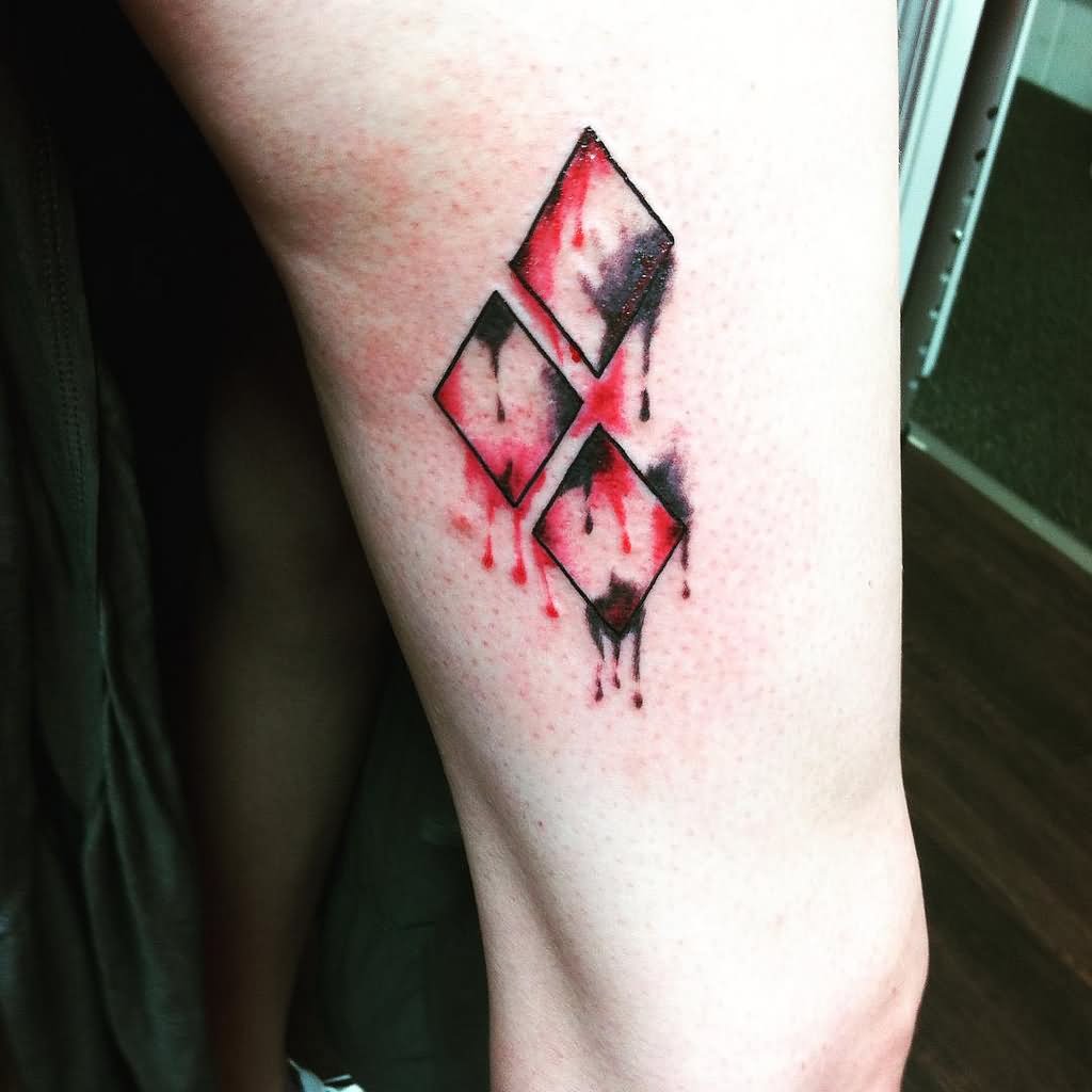 Harley Quinn Symbols Tattoo On Thigh