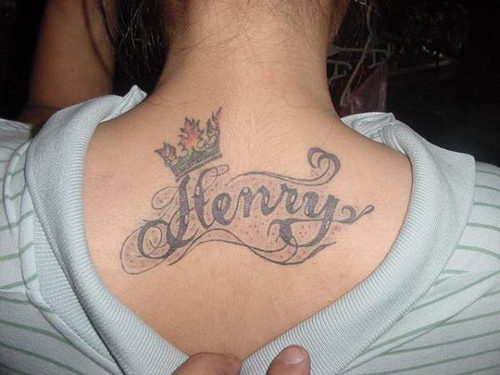 Henry Name With Crown Tattoo On Upper Back