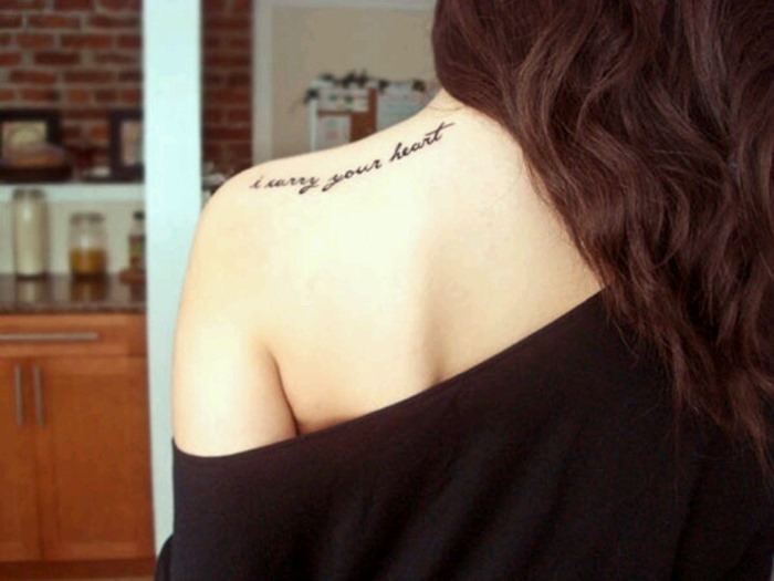 I Carry Your Heart Lettering Tattoo On Women Left Back Shoulder