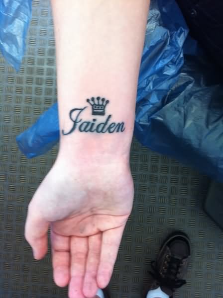 Jaiden Name With Crown Tattoo On Right Wrist By Keith Elbourn