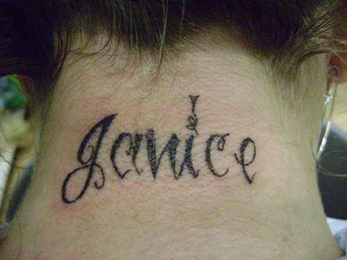 Janice Name Tattoo On Girl Back Neck