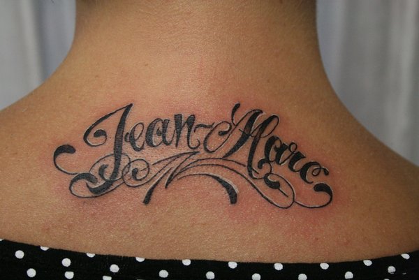 Jean Mare Name Tattoo On Upper Back By 2Face